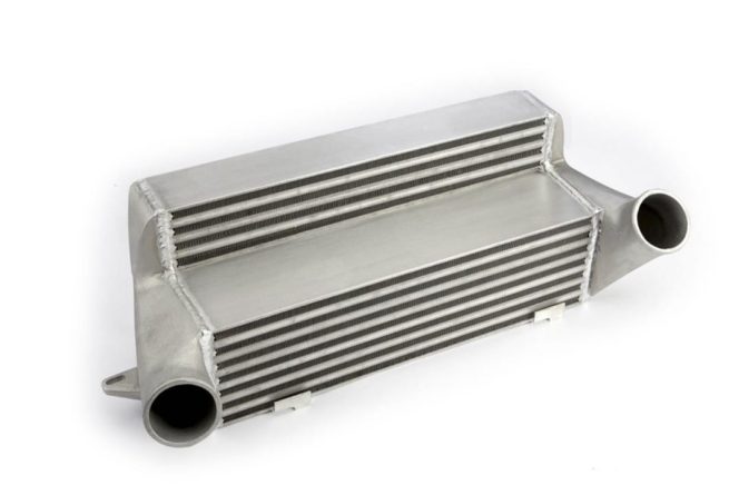 a silver metal object with a pipe