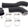 a black plastic pipes with metal clamps
