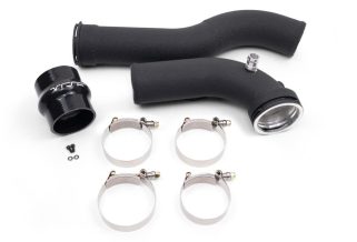 a black plastic pipes with metal clamps