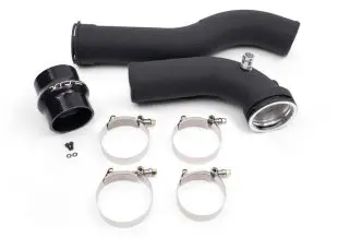 a black plastic pipes with metal clamps