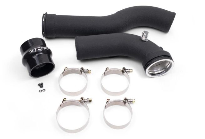 a black plastic pipes with metal clamps